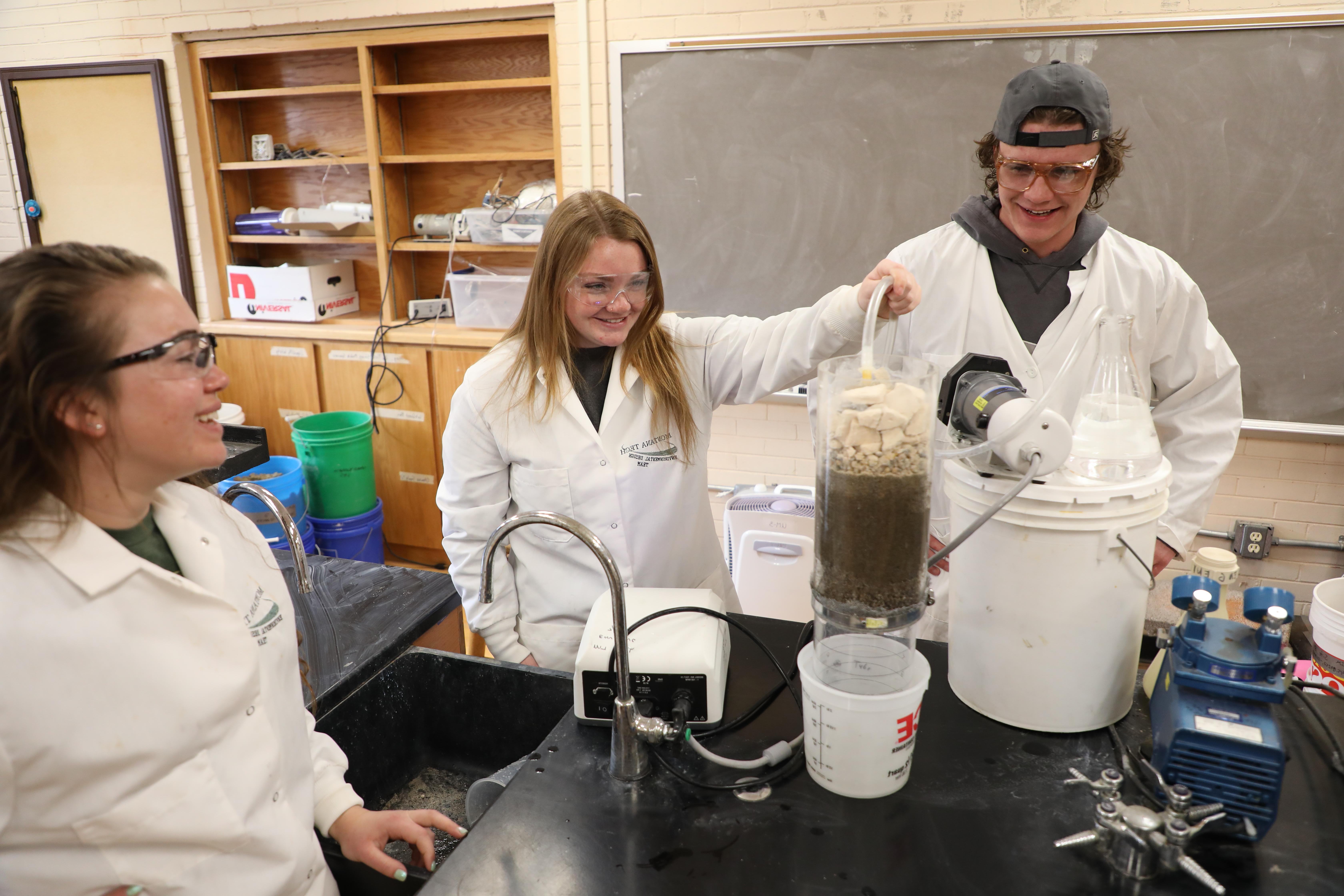 Students work on a science experiment.